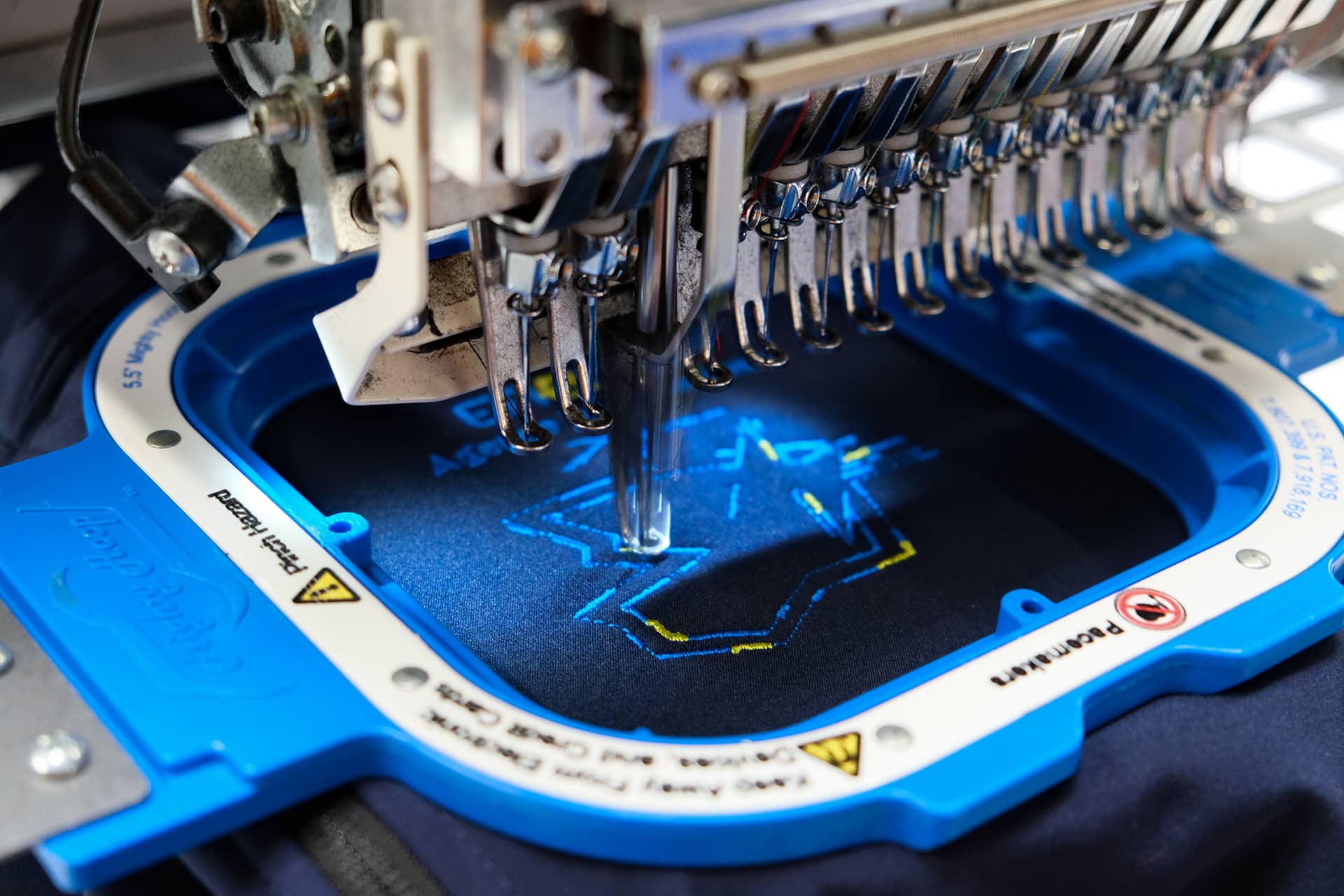 personnalisation textile par broderie chez Largeot et Coltin